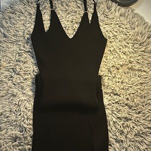 Little black dress knee length with a slit on the left side super sexy